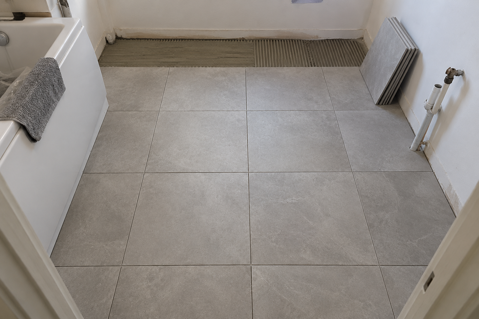 Illustrative bathroom floor tiling work